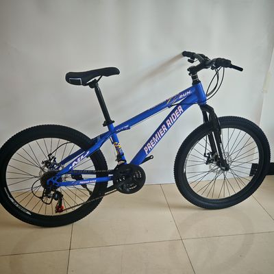 Bicicleta de montaña barata de 24 pulgadas y 21 velocidades con suspensión
